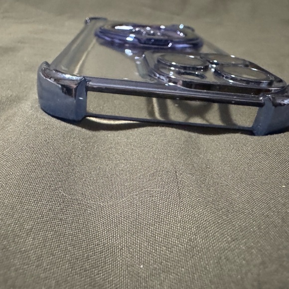 Clear Phone Case with Blue Accents For a 15 Pro Max. Spinning wheel in Center. - Picture 11 of 14